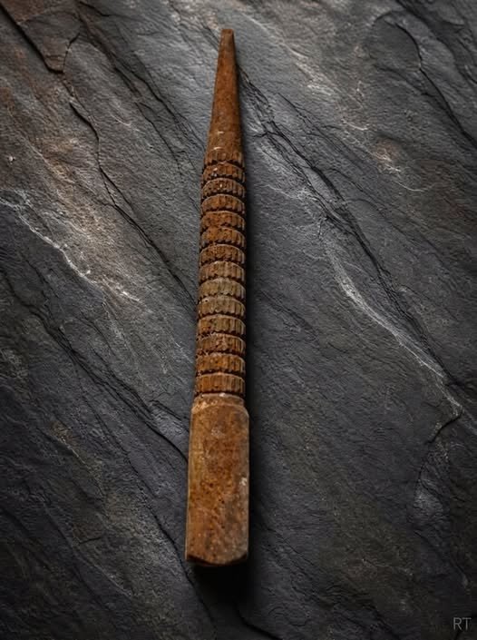 Uncovering History: The Vintage Carved Wooden Spindle Tool